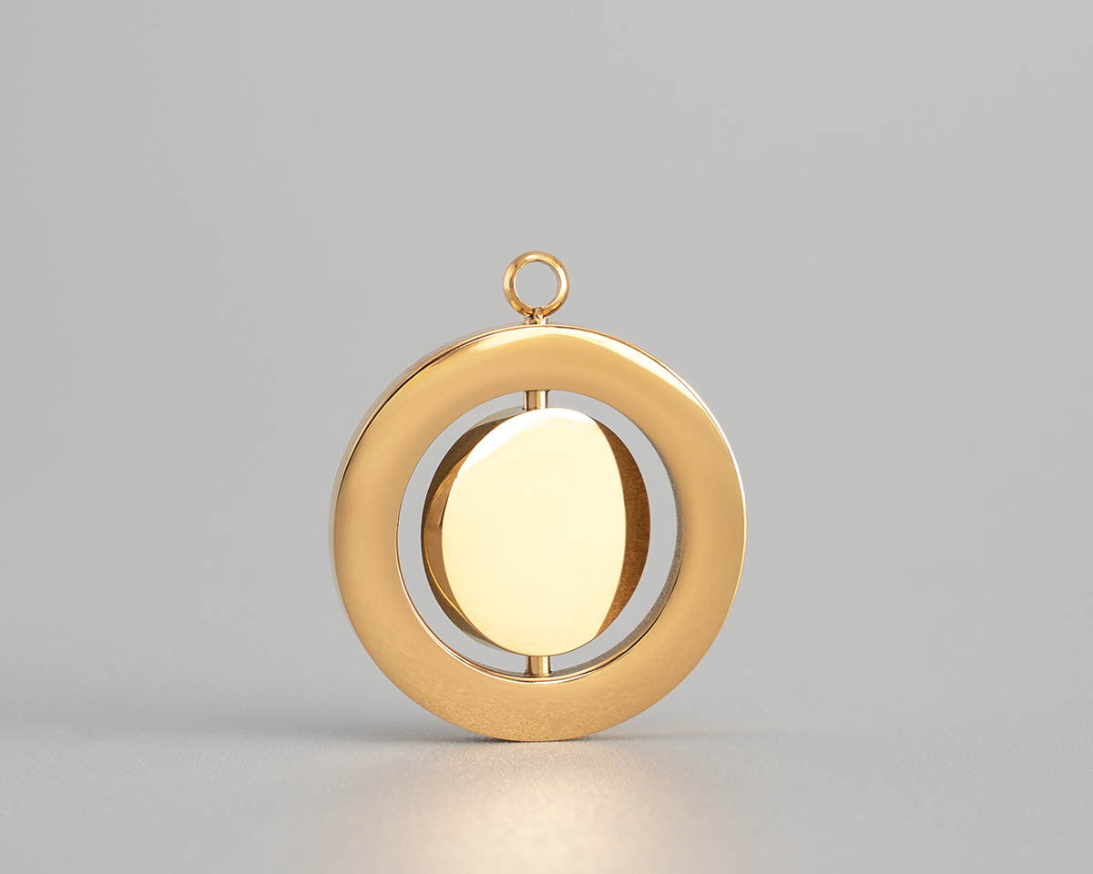 Drehbares Medaillon mit Abdruck