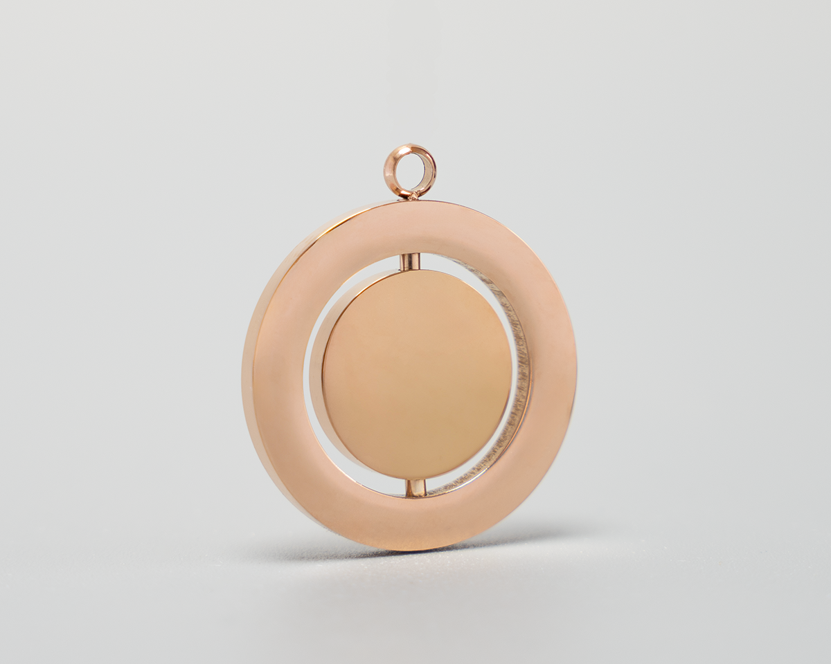 Drehbares Medaillon mit Abdruck