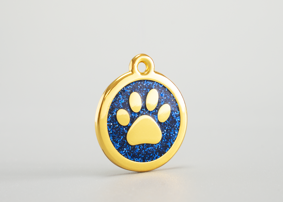 goldene Hundemarke mit Pfote