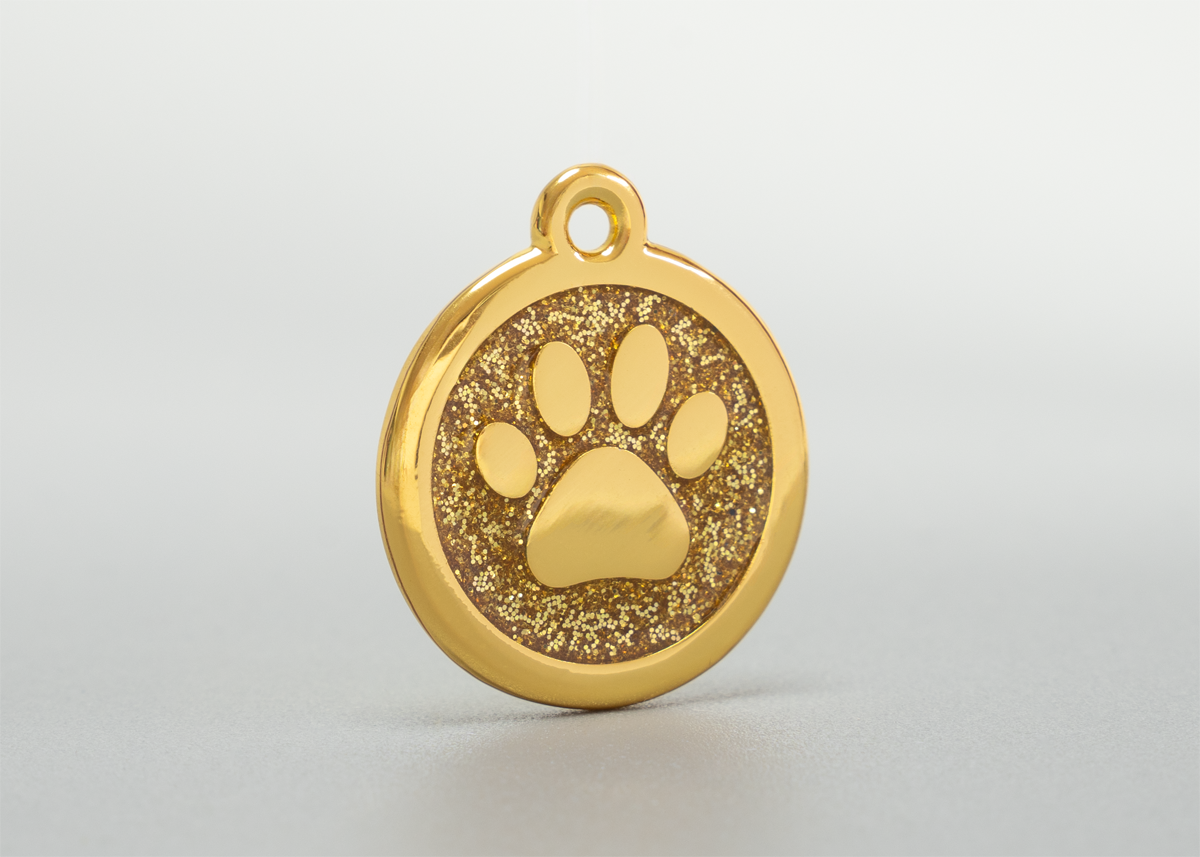 goldene Hundemarke mit Pfote