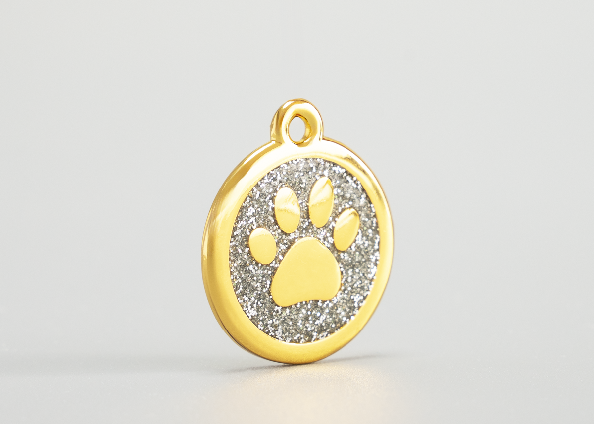 goldene Hundemarke mit Pfote