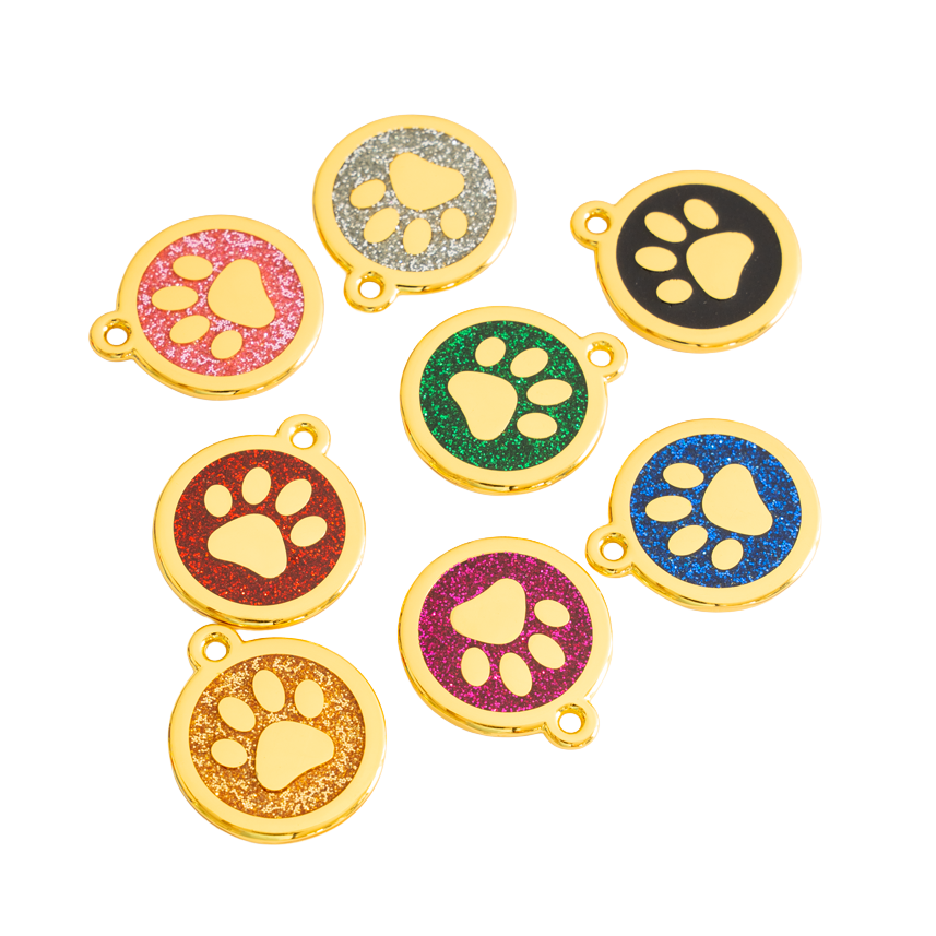 goldene Hundemarke mit Pfote