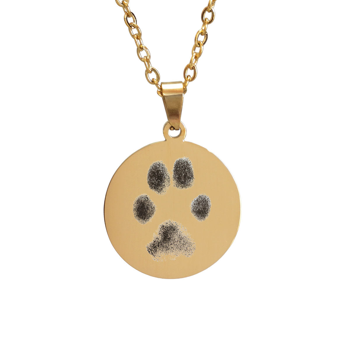 Goldene Halskette mit graviertem Pfotenabdruck eines Hundes