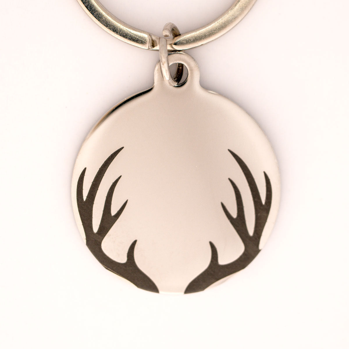 silberne Edelstahl Hundemarke personalisiert mit einem Geweih 