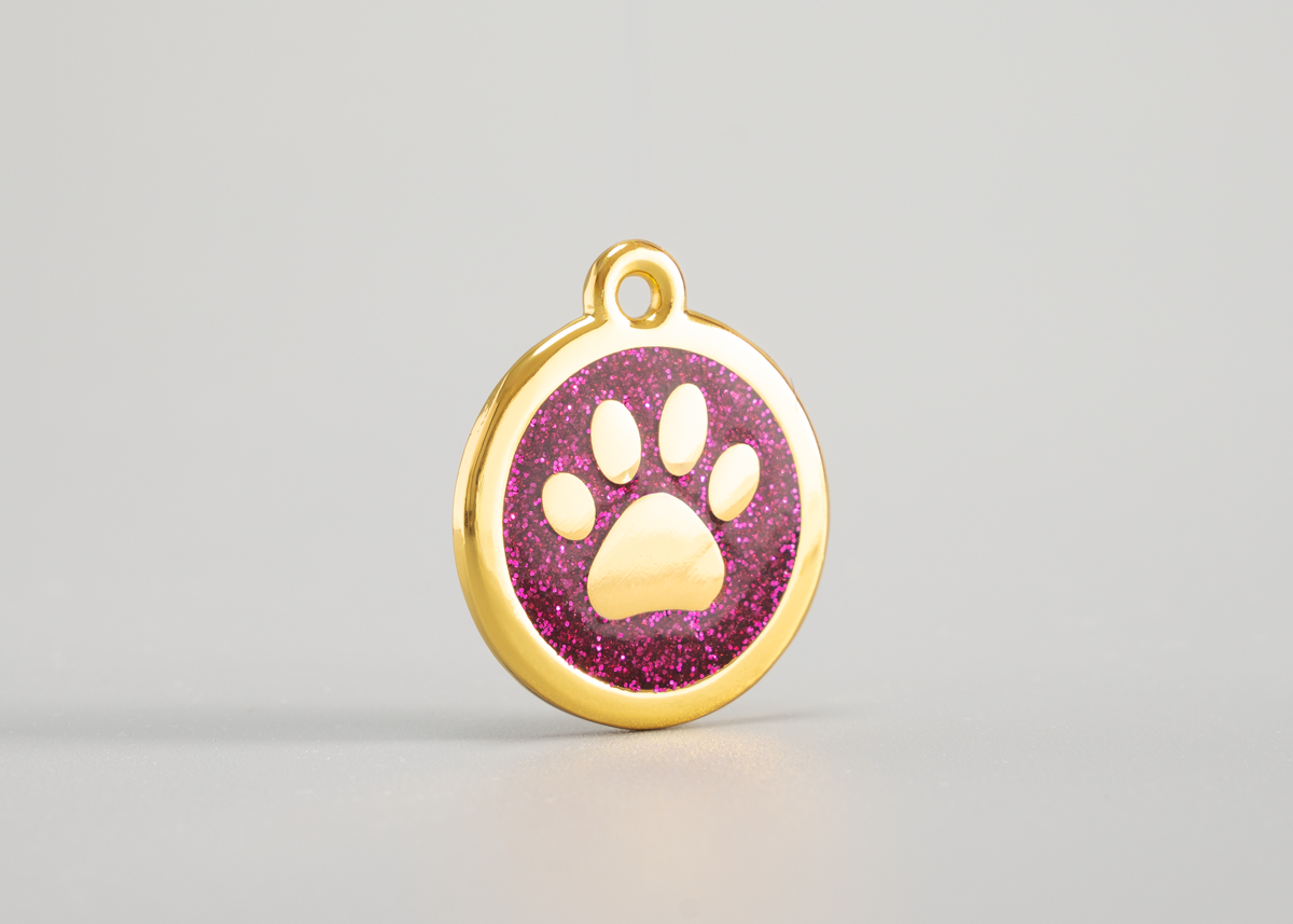 goldene Hundemarke mit Pfote